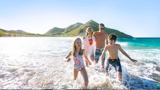 Family enjoying beach