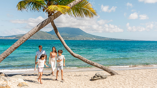 Family of four by the beach